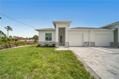 1155 Countess Ave, Lehigh Acres, FL 33974 - photo 3