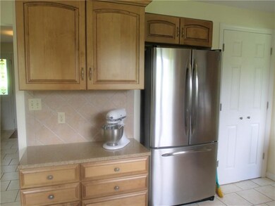 New cabinets and a neutral back splash make this k