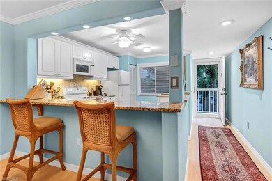 3041 Sandpiper Bay Cir unit 201, Naples, FL 34112 - photo 2