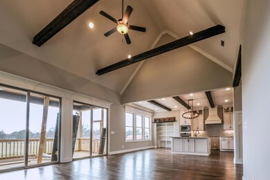 Wall of windows provides wonderful natural light in kitchen and great room.