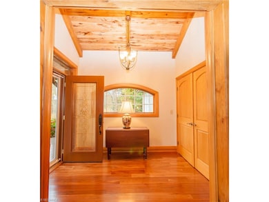 7' x 9' foyer with a large coat closet. -Flooring-