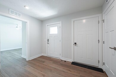 Front Door & Garage Entry