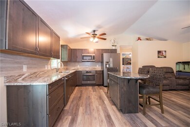 1056 Fleetwood Dr NW, Port Charlotte, FL 33948 - photo 7