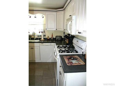 Kitchen. Built in dishwasher and microwave stay ~ 