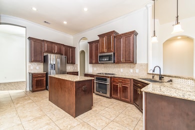 Kitchen with 42” cabinets, under-cabinet lighting,
