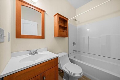 Full bathroom with vanity, toilet, and bathtub / shower combination