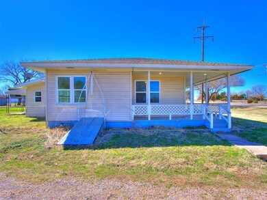 View of front of home featuring a porch, a shingle