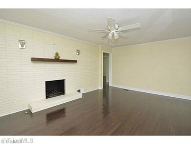 Living Room. Wood burning fire place. Wired for a flat screen TV above fireplace.