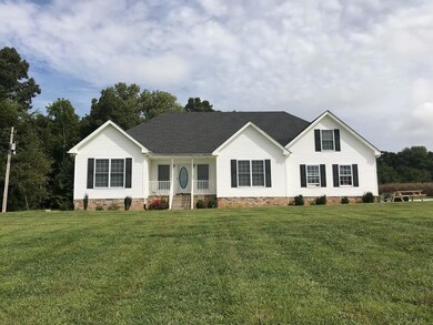Sit back and sip a ice cold glass of sweet tea on your covered front porch!