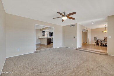 Living & Dining flow to Kitchen.