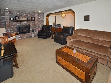 Nicely sized family room with fireplace, and anoth