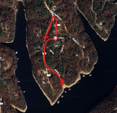 public opening to Beaver Lake walking distance from the house.
One arrow is walking trail to the back of the property onto Hickory Ln. The other is driving.