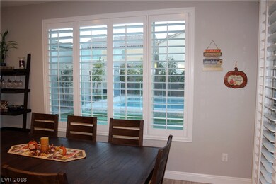 Dining room and view of the beautiful pool and man