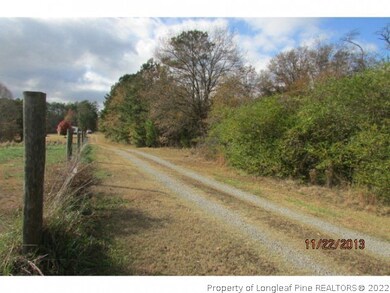 home sits off the road on 4 ac