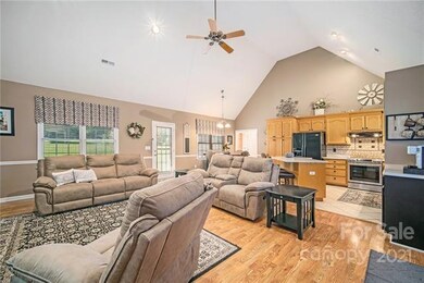 Step inside the open concept living room / kitchen