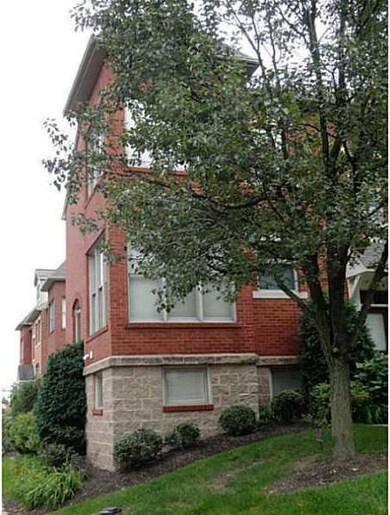 Exterior Front. The turret adds additional space t