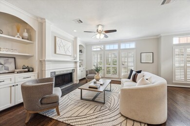 The second-floor living offers a wall of front win
