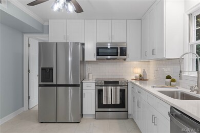Stainless appliances with new refrigerator.
