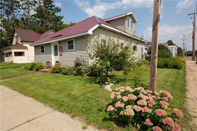 Very nice lawn and established flower beds
