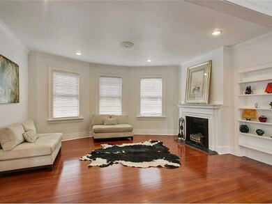 THE FORMAL LIVING ROOM OR ADULT DEN HAS 3 BAY WIND