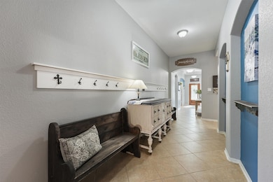 Along the extended foyer, show off family photos,