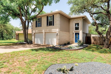 View of front of house featuring brick siding, a 