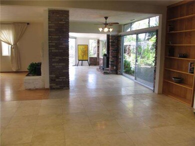 Family room area with access to side and back yard