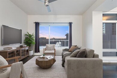 Living area featuring wood finished floors and a 