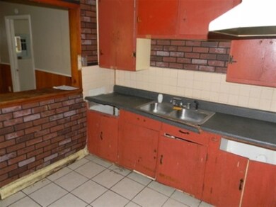 KITCHEN HAVE LOTS OF CABINETS.