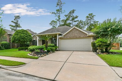 Double wide driveway and updated extra wide single garage door for ease of parking and convenience.