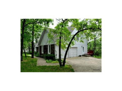 Quality home - 1983 .... many trees and side entry