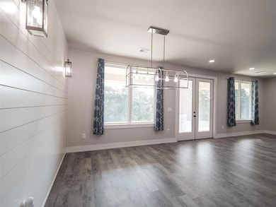 Tons of natural light in the living/dining room.
