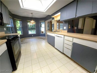 Kitchen featuring dishwasher, electric range, ligh