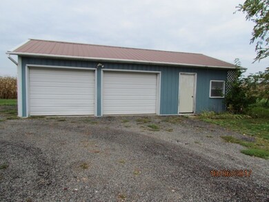 Pole Barn is a 2-car garage with an a separate wor