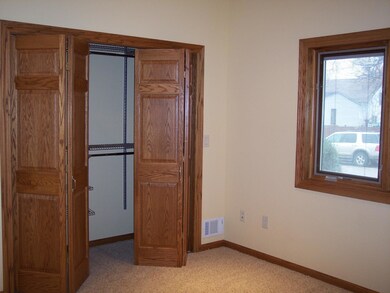 built in shelves in lighted closet<|><|>