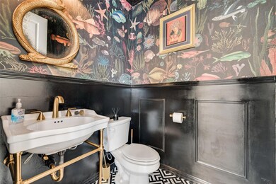 Bathroom featuring sink and toilet