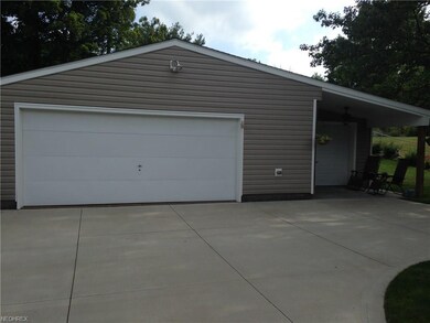 He will LOVE this over-sized 2 1/2 car garage plus