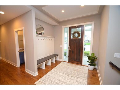 Front entry with built-in boot bench.