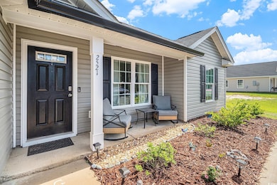 Doorway to property with a porch
