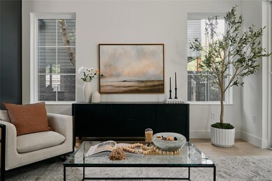 Living area with plenty of natural light, wood fi