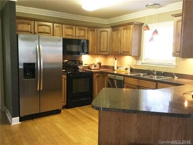 Spacious kitchen with under cabinet lighting - all
