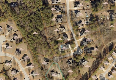 Aerial overview of property's location featuring property parcel outlined