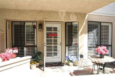 Inviting patio with brick ribbons.