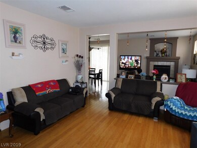 Enter into this formal living area w/custom floori