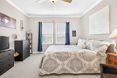 Large primary suite with ensuite bath and walk in closet.