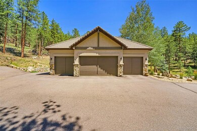 4 car garage plus an RV parking spot with 50amp po