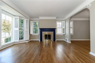 Living room with fireplace and hardwood floors