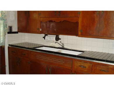Kitchen - Refrigerator, range, washer convey, tile