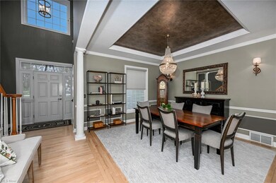 Formal Dining Room has Dimmable Lighting and Cove 