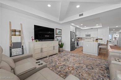 Living room with view down long entryway. Look at